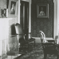 crest chair in dining room, 1880s picture, JNB archives.jpg