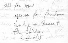 signature from a
letter, reading, 'all for now / yours for
freedom / Judge + Annie + / the children / (smile)'